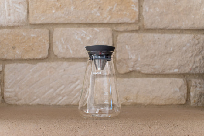 HARIO conical tea pitcher in a home setting.