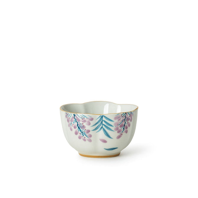 Wisteria porcelain teacup with green leaves and hanging pink-purple flowers.