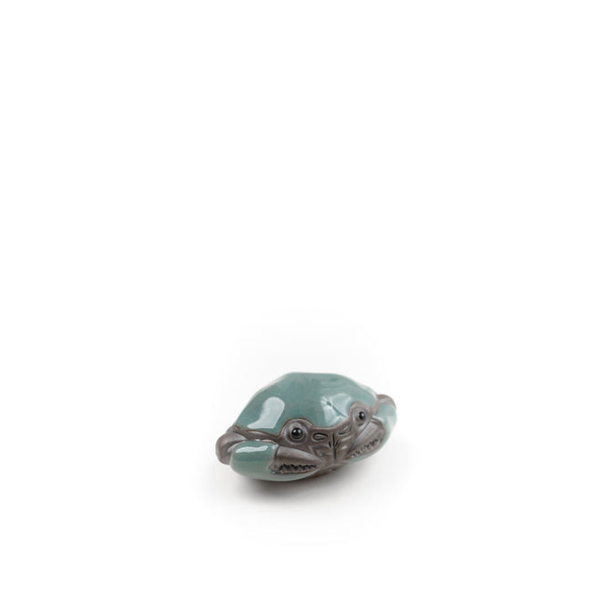 Mr. Crab tea pet with a pale green shell and sculpted claws.